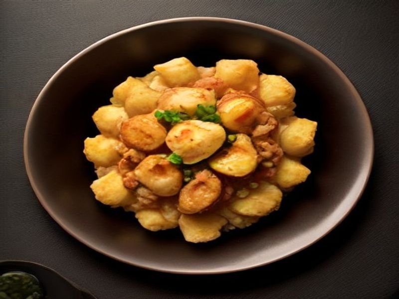Glazed King Oyster Mushroom 'Scallops' with Cauliflower-Truffle Silk and Crispy Sunchoke Chips